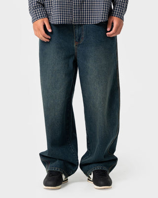 Man wearing Boneyard Cacoon Jean in Dark N Dirty