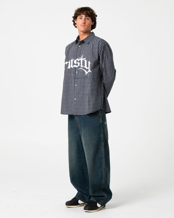 man-wearing-boneyard-cacoon-jean-in-dark-n-dirty