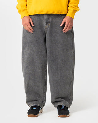 Man wearing Boneyard Cacoon Jean in Washed Black