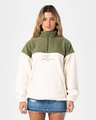 Woman wearing Central Division Crew Polar Fleece in Khaki / Cream