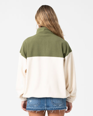 Woman wearing Central Division Crew Polar Fleece in Khaki / Cream