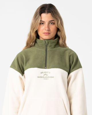 Woman wearing Central Division Crew Polar Fleece in Khaki / Cream