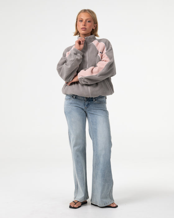 woman-wearing-two-tides-zip-through-sherpa-fleece-in-pink-a-boo-grey
