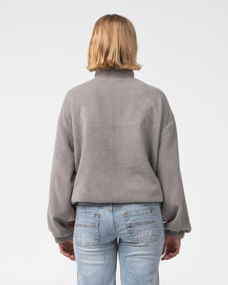 Woman wearing Two Tides Zip Through Sherpa Fleece in Pink A Boo / Grey
