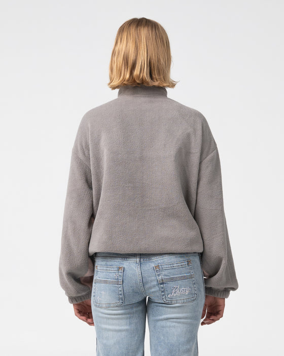 woman-wearing-two-tides-zip-through-sherpa-fleece-in-pink-a-boo-grey