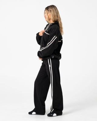 Woman wearing Bind Me Up Contrast Polar Fleece in Black