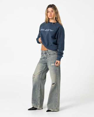 Woman wearing Caliway DIY Crew Neck Fleece in Washed Blue