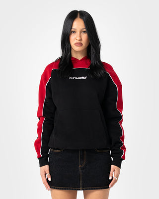 Woman wearing Pump It Up Hooded Fleece in Black
