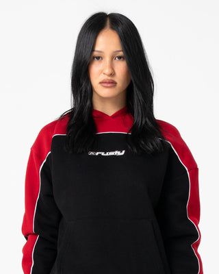 Woman wearing Pump It Up Hooded Fleece in Black