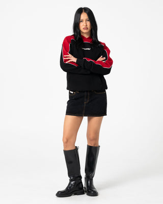 Woman wearing Pump It Up Hooded Fleece in Black