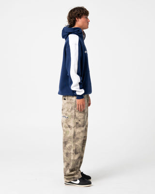Man wearing 2K Sing 2.0 Hooded Fleece in Dark Blue