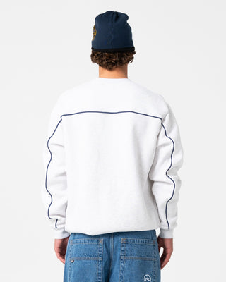 Man wearing Trigger Crew Fleece in Ecru Marle