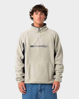 Man wearing Blizzard Quarter Zip Polar Fleece in Abbey Stone