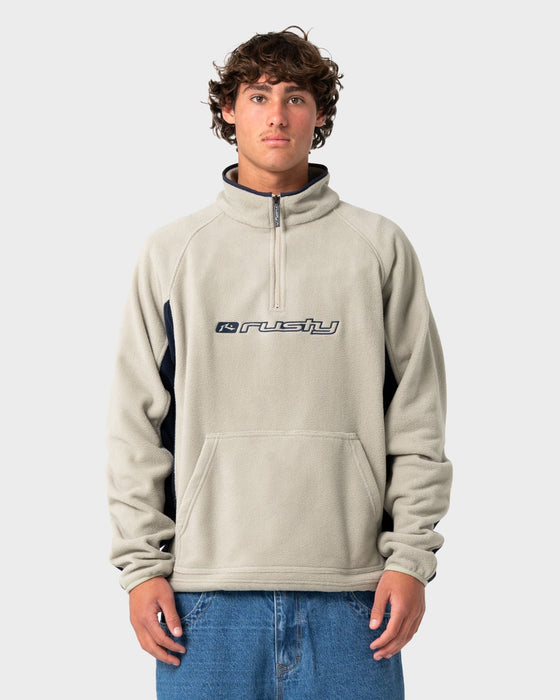 man-wearing-blizzard-quarter-zip-polar-fleece-in-abbey-stone