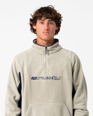 Man wearing Blizzard Quarter Zip Polar Fleece in Abbey Stone