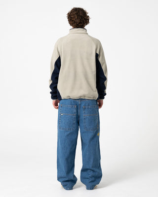 Man wearing Blizzard Quarter Zip Polar Fleece in Abbey Stone