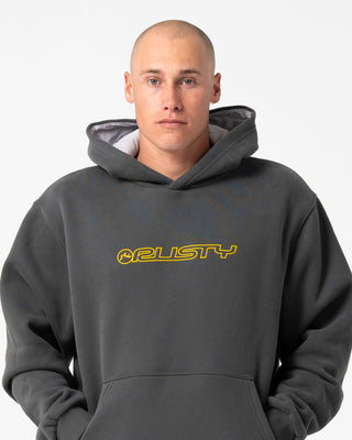 Man wearing Outliner Hooded Fleece in Carbon