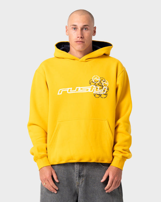 man-wearing-rusteeze-hooded-fleece-in-gold-fusion