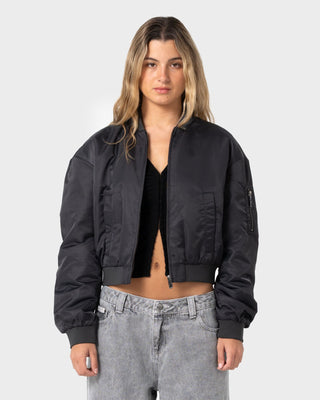 Woman wearing Baddie Bomber Jacket in Carbon