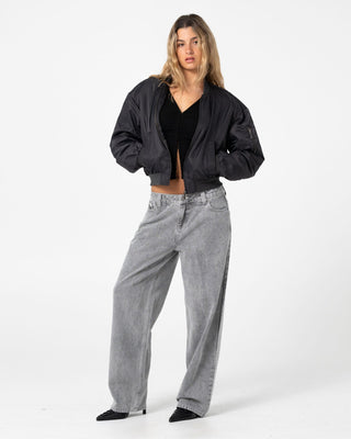 Woman wearing Baddie Bomber Jacket in Carbon