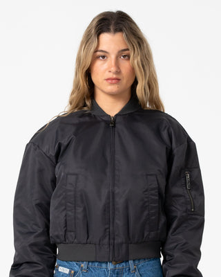 Woman wearing Baddie Bomber Jacket in Carbon