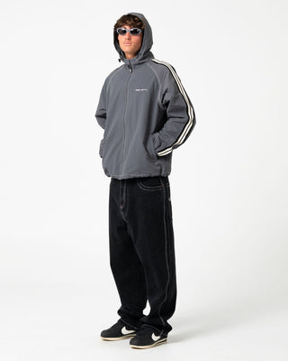 Man wearing Lock Out Hooded Jacket in Steel Blue