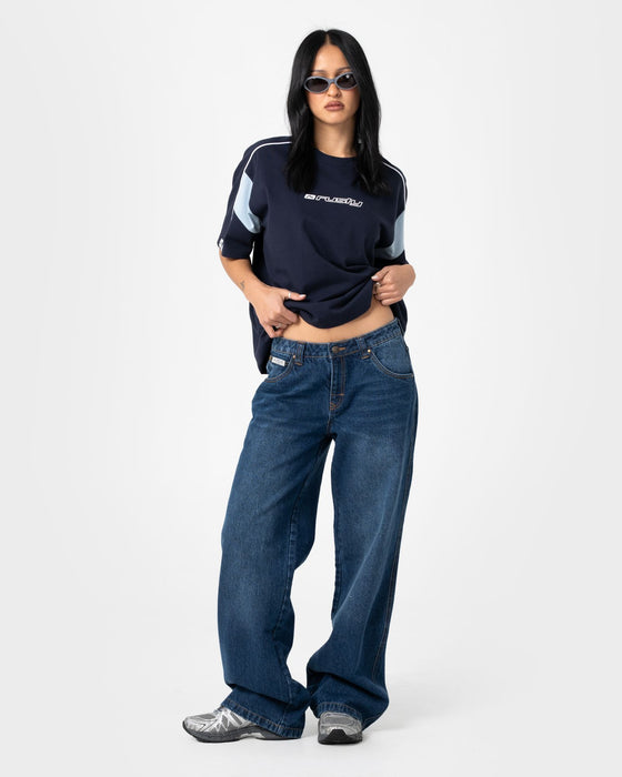 woman-wearing-lucy-loose-low-rise-jean-in-blasted-deep-sea-blue