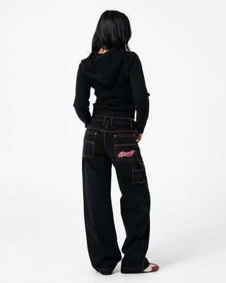 Woman wearing Billie 2.0 Low Rise Carpenter Jean in Black Out