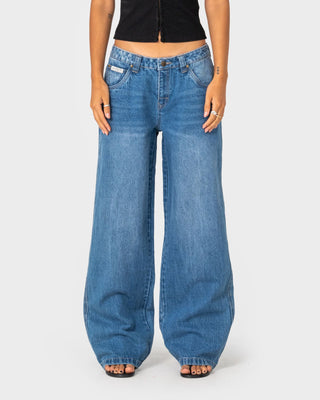 Woman wearing Wendy Wide Low Rise Denim Jean in Blasted Middy Blue