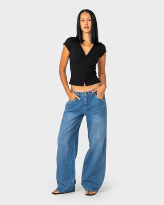 woman-wearing-wendy-wide-low-rise-denim-jean-in-blasted-middy-blue