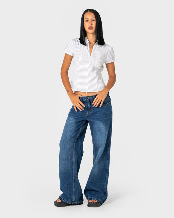 woman-wearing-wendy-wide-low-rise-denim-jean-in-blasted-deep-sea-blue