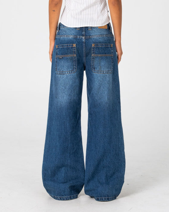 woman-wearing-wendy-wide-low-rise-denim-jean-in-blasted-deep-sea-blue