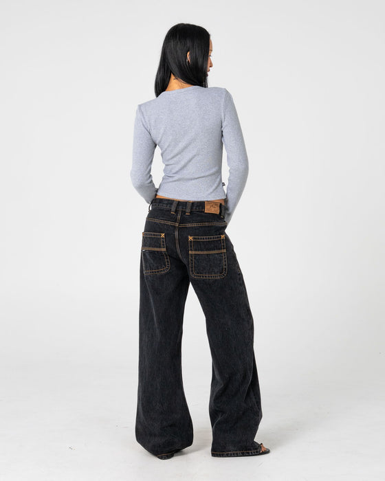 woman-wearing-wendy-wide-low-rise-denim-jean-in-black-out