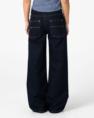 Woman wearing Wendy Wide Low Rise Denim Jean in Raw Dawg