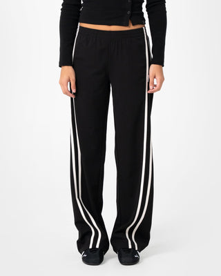 Woman wearing Bronson Low Rise Trackpant in Black