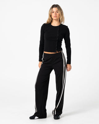 Woman wearing Bronson Low Rise Trackpant in Black