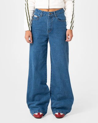 Woman wearing Cyprus Wide Leg High Waist Jean in Authentic Blue