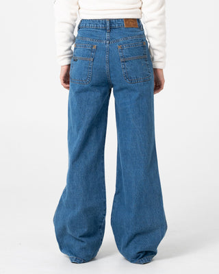 Woman wearing Cyprus Wide Leg High Waist Jean in Authentic Blue