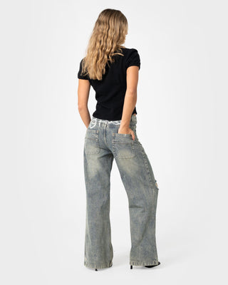 Woman wearing DIY Wendy Wide Low Rise Wide Leg Jean in Dirty Dawg