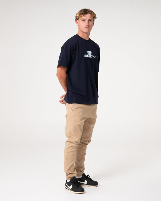 man-wearing-hook-out-elastic-pant-in-khaki