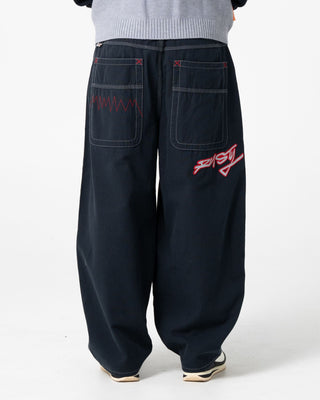 Man wearing Step-stone Cacoon Pant in Navy Blue