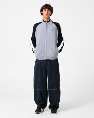 Man wearing Step-stone Cacoon Pant in Navy Blue