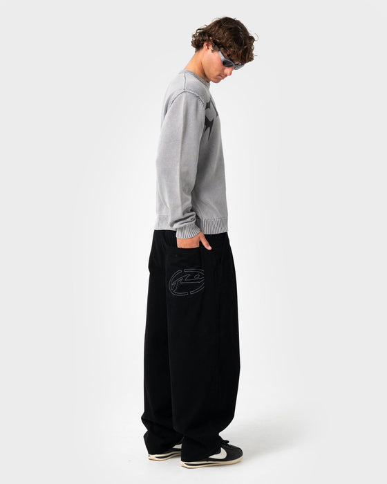 man-wearing-enigma-pleated-pant-in-black