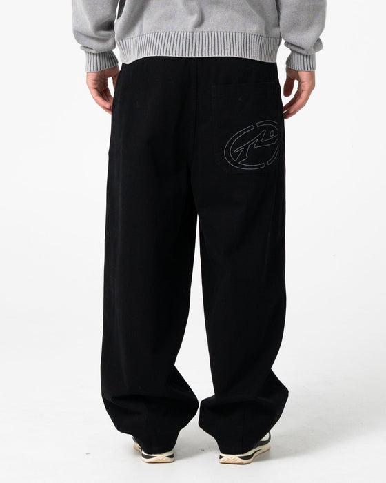 man-wearing-enigma-pleated-pant-in-black