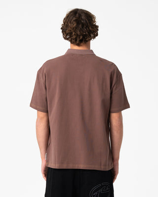 Man wearing Blinker Short Sleeve Polo in Pinecone