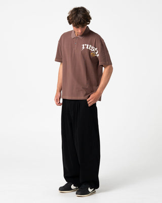 Man wearing Blinker Short Sleeve Polo in Pinecone