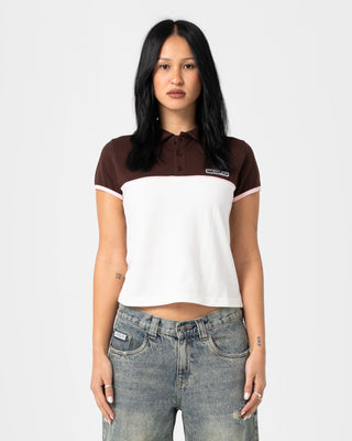 Woman wearing Insert Dad Joke Baby Polo Tee in Cream / Choc