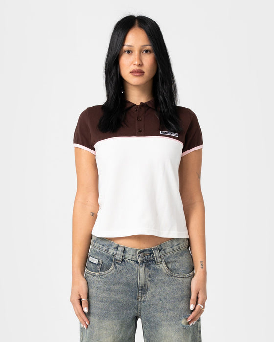 woman-wearing-insert-dad-joke-baby-polo-tee-in-cream-choc