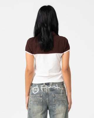 Woman wearing Insert Dad Joke Baby Polo Tee in Cream / Choc