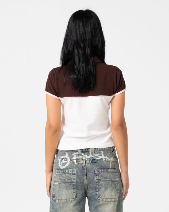 woman-wearing-insert-dad-joke-baby-polo-tee-in-cream-choc